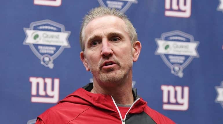 New York Giants Defensive Coordinator Steve Spagnuolo answers questions from...