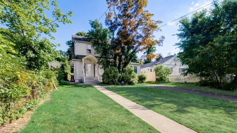 Priced at $678,000, this Colonial on Elm Avenue has been...