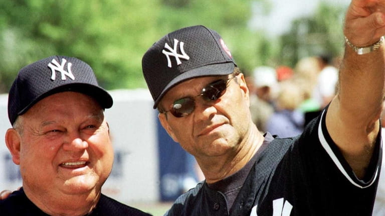 Yankees coach Don Zimmer, left, and manager Joe Torre on...