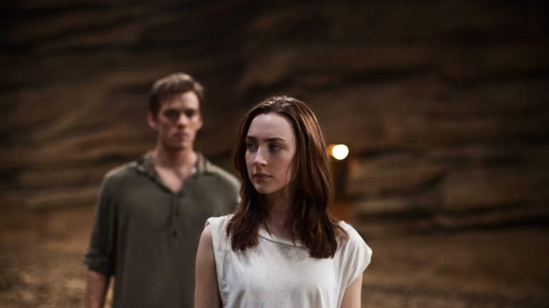 Jake Abel and Saoirse Ronan star in "The Host," the...