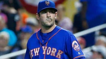 New York Mets starting pitcher Matt Harvey heads back to...