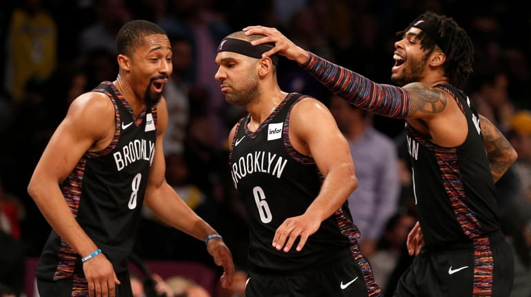 Jared Dudley #6 of the Nets celebrates a basket late...