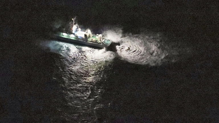 A Japan's coast guard vessel conducts search and rescue operation...