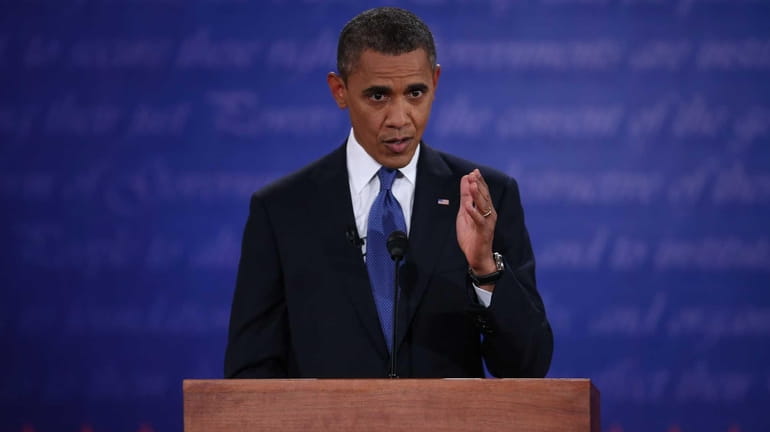 President Barack Obama speaks during the Presidential Debate at the...