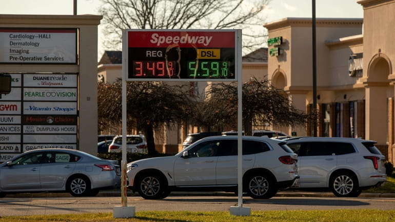 Prices are posted at a gasoline station in Stony Brook...