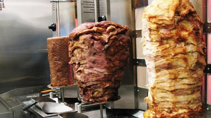 Gyros, from left: beef-lamb, pork and chicken at Kalamaki in...