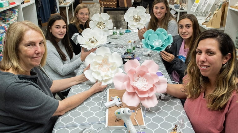 An oversized paper flower-making class at Hitch LI's pop up...