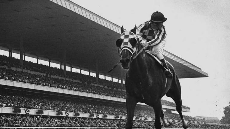 Jockey Ron Turcotte rides Secretariat in the 1973 Belmont Stakes.