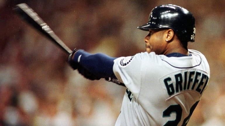 Ken Griffey Jr. connects for his 40th home run of...