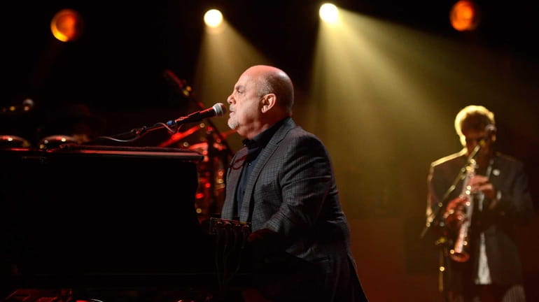 Billy Joel performs at "12-12-12" a concert benefiting The Robin...