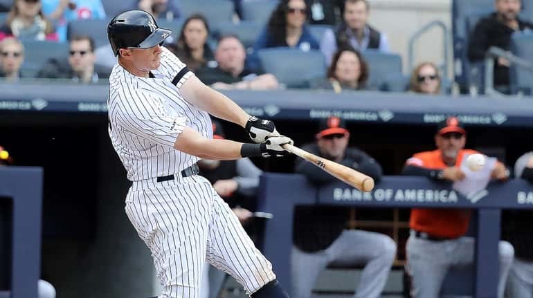 Yankees' DJ LeMahieu doubles to leftfield in the ninth inning at Yankee Stadium...