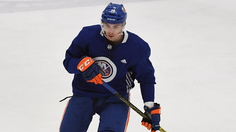 Islanders left wing Michael Dal Colle skates in a scrimmage...