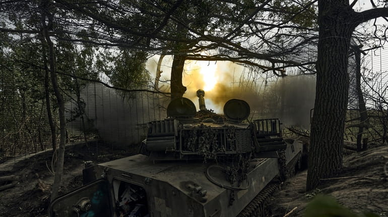 A Ukrainian self-propelled artillery system fires towards the Russian positions...