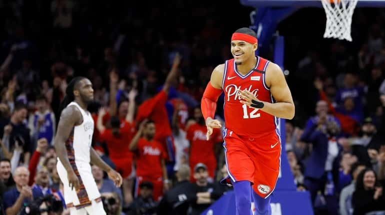 Philadelphia 76ers' Tobias Harris reacts after making a 3-pointer during...