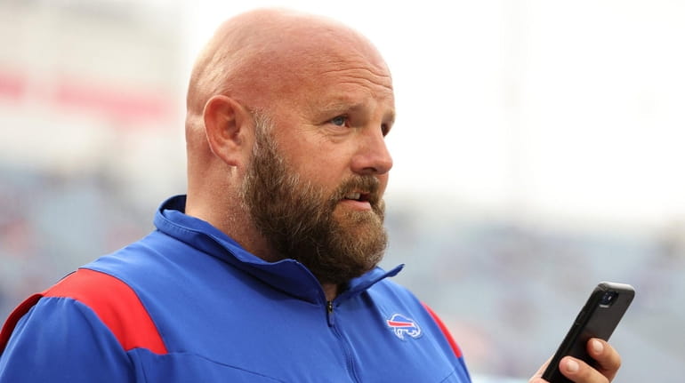 Bills offensive coordinator Brian Daboll looks on prior to a game...