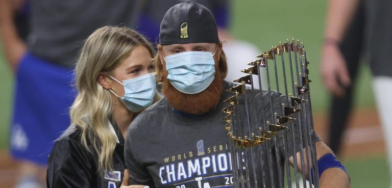 Justin Turner of the Los Angeles Dodgers and his wife...