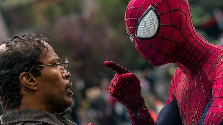 Jamie Foxx, left, and Andrew Garfield as Spider-Man in "The...