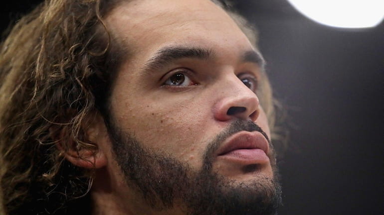 Knicks center Joakim Noah looks on during a time out...