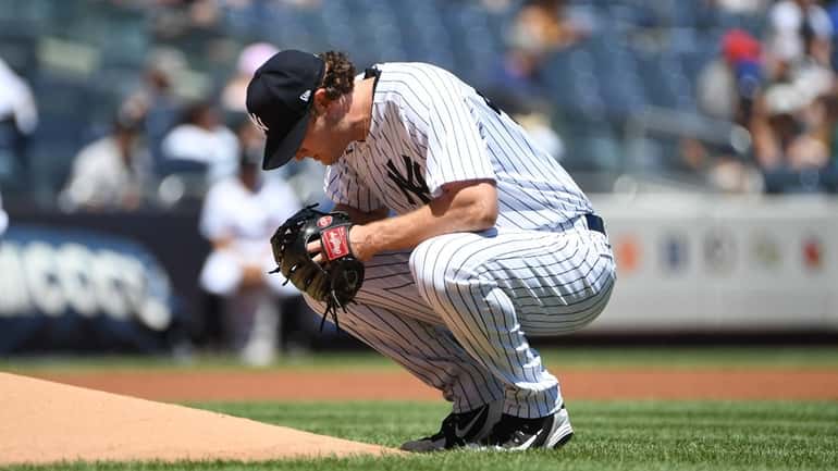 New York Yankees starting pitcher Gerrit Cole gave up three...