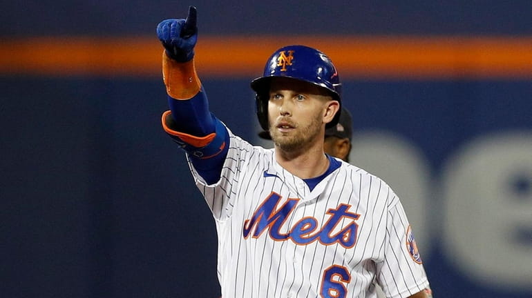 Jeff McNeil #6 of the Mets reacts at second base after...