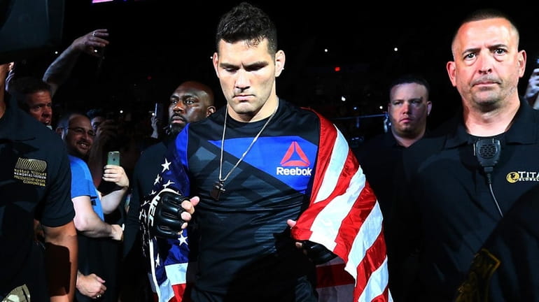 Chris Weidman walks to the cage at Nassau Coliseum on July...