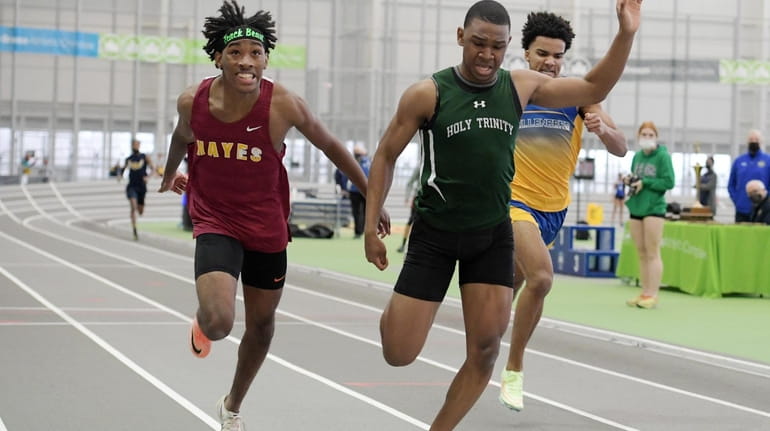 Titans' Myles Small takes the 300 meters in a state-best...