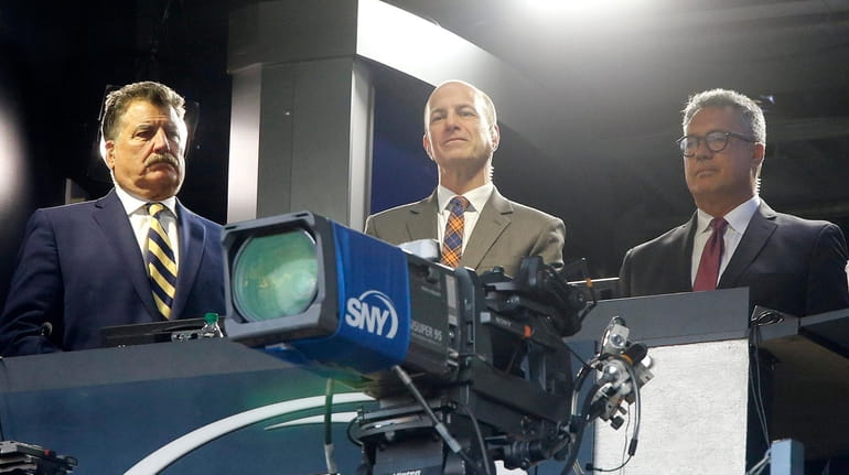 From left, SNY broadcasters Keith Hernandez, Gary Cohen and Ron Darling prepare...