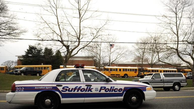 Suffolk police patrol the area as students are dismissed for...