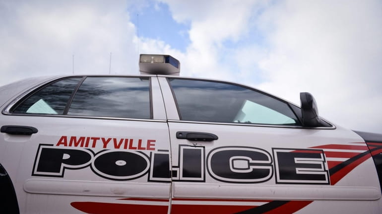 Amityville is considering eliminating the vacant police commissioner position created...
