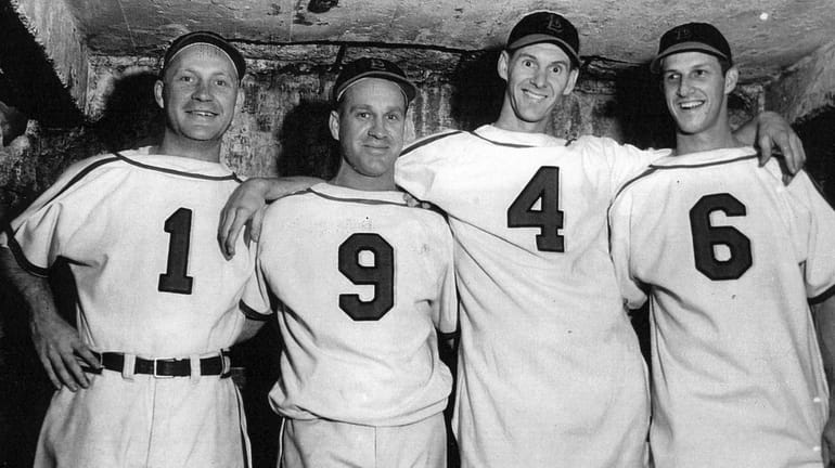 The Cardinals celebrate their 1946 World Series win. #1--Whitey Kurowski,...