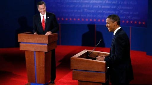 President Barack Obama and Republican presidential nominee Mitt Romney laugh...