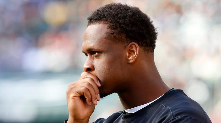 Geno Smith #7 of the New York Jets looks on...