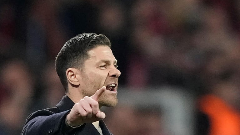 Leverkusen's head coach Xabi Alonso gestures during the German Bundesliga...