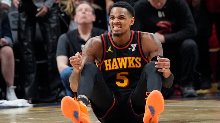Atlanta Hawks guard Dejounte Murray (5) reacts after being fouled...