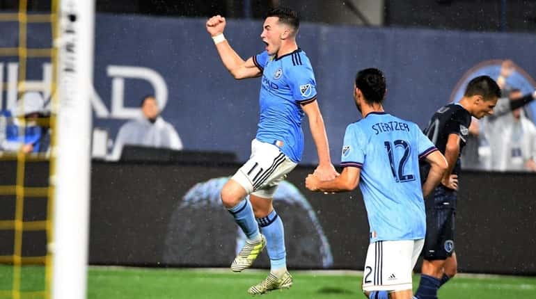NYCFC's Jack Harrison celebrates after scoring a goal against Sporting...