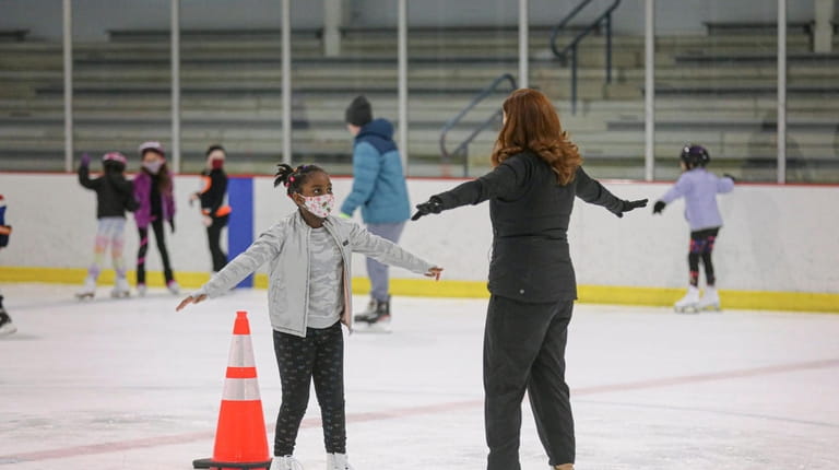 Hope Silverman, seen here with Madison Ruckman, 7, at Dix...