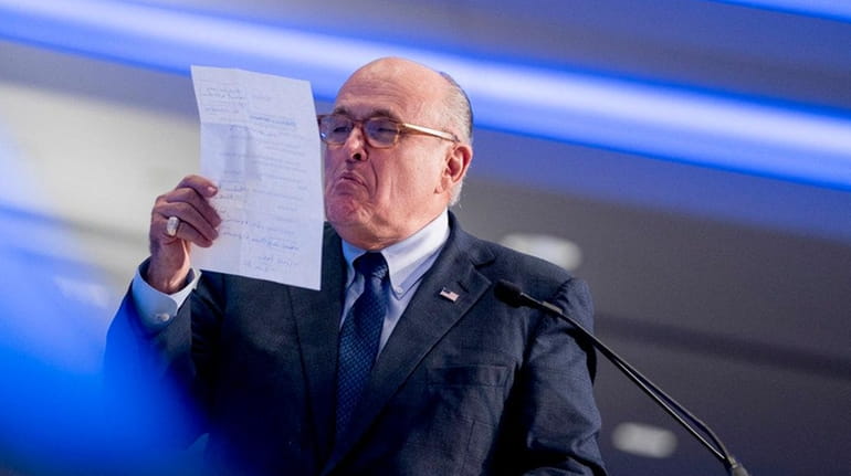 Rudy Giuliani pretends to spit on the Iran nuclear agreement...