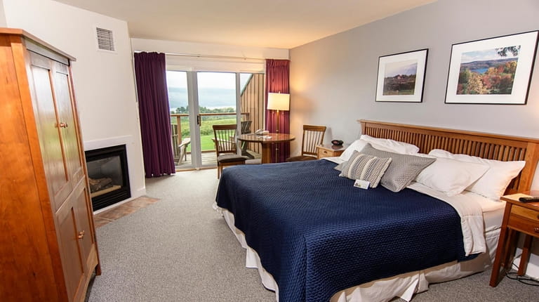 A guestroom at The Inn at Glenora Wine Cellars in...