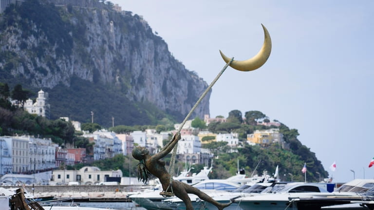 The bronze sculpture by Giacinto Bosco titled "swing on the...