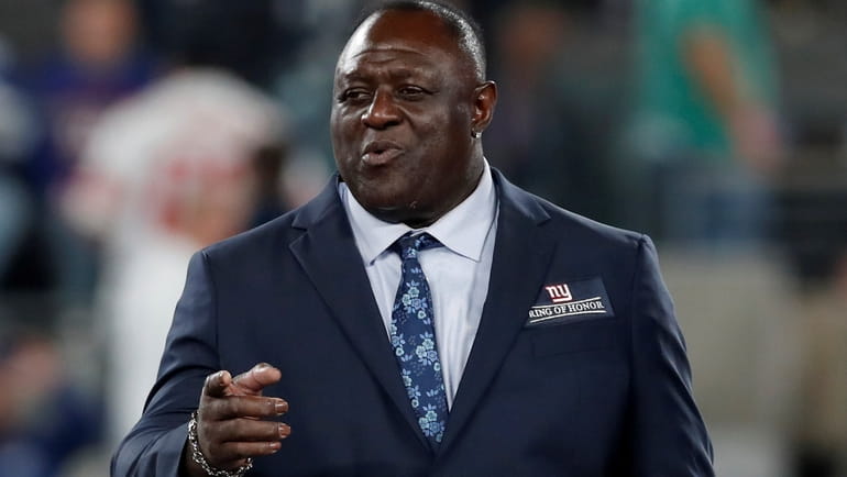 Leonard Marshall receives his Ring of Fame jacket during a...