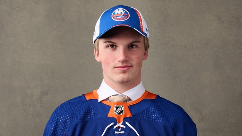 Calle Odelius, No. 65 pick by the Islanders, poses for...