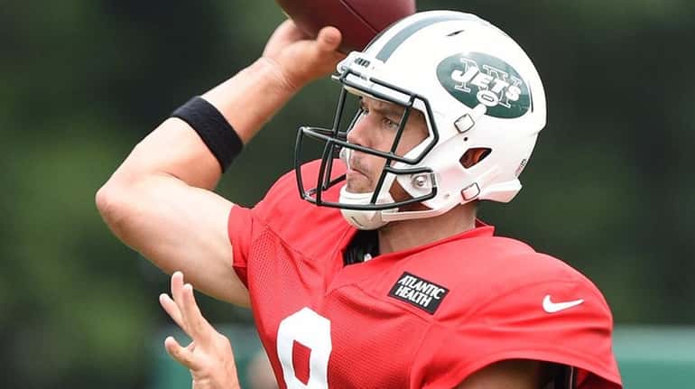 New York Jets quarterback Bryce Petty passes the football during...