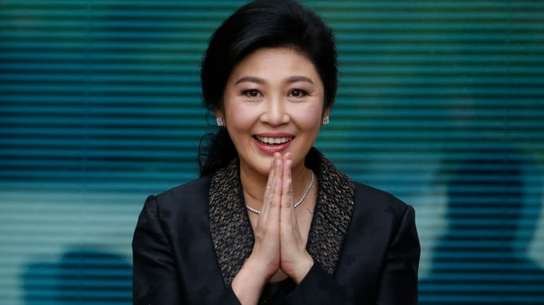 Thailand's former Prime Minister Yingluck Shinawatra arrives at the Supreme...