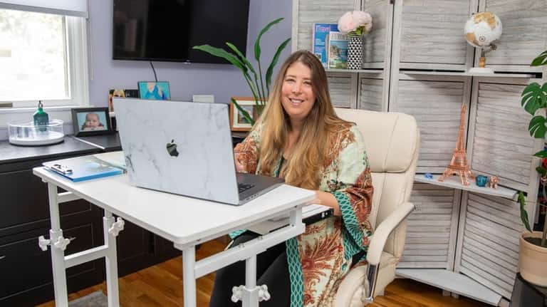Wanderology Luxury Travel owner Rebecca Alesia works from her home office...