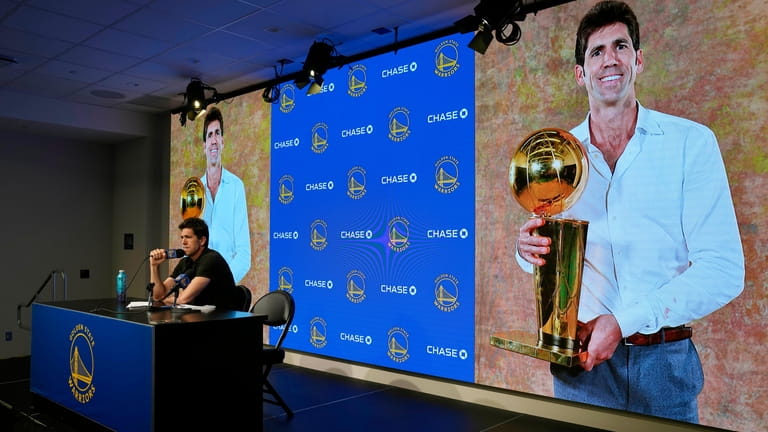 Golden State Warriors president and general manager Bob Myers makes...