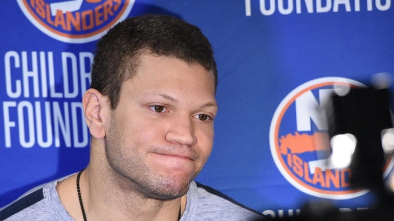 New York Islanders right wing Kyle Okposo speaks with the...