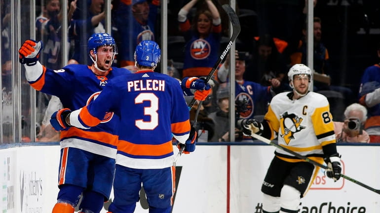 Brock Nelson #29 of the Islanders celebrates his first goal...