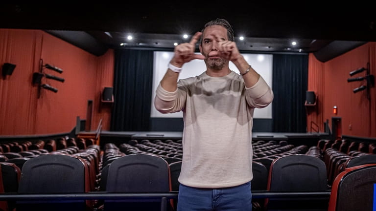 Bradley Porche´ discusses his moviegoing experience, using sign language. 