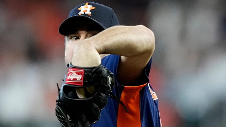 Houston Astros starting pitcher Justin Verlander throws against the Baltimore...