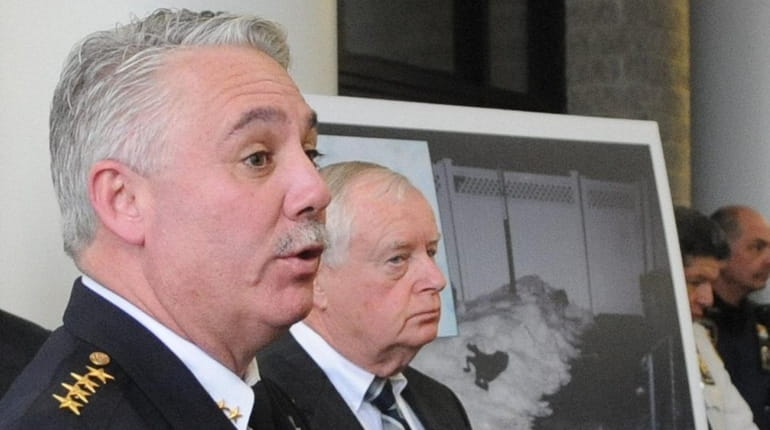Former Suffolk County Police Chief James Burke, left, at a...